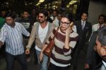 Shahrukh Khan and Deepika Padukone return from Dubai AAA concert in Mumbai on 2nd Dec 2013